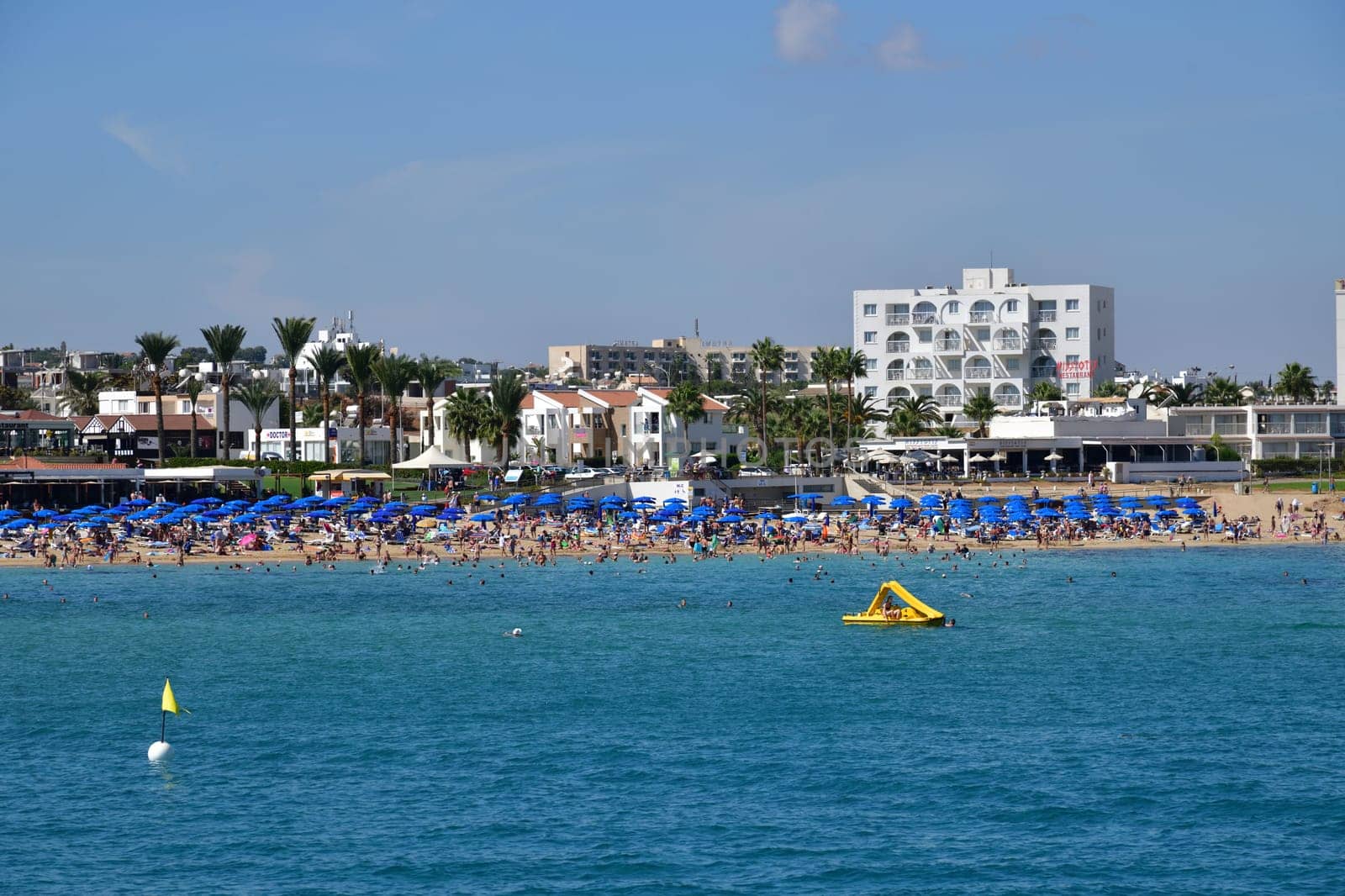 Protaras, Cyprus - Oct 10. 2019. A number of hotels on the popular Sunrise Beach by olgavolodina