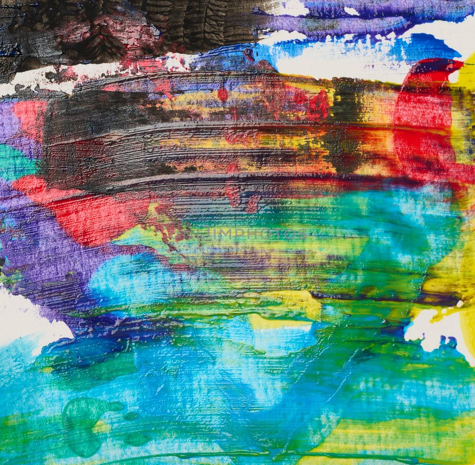 Strokes of multi-colored oil paint on a white sheet of paper, close up