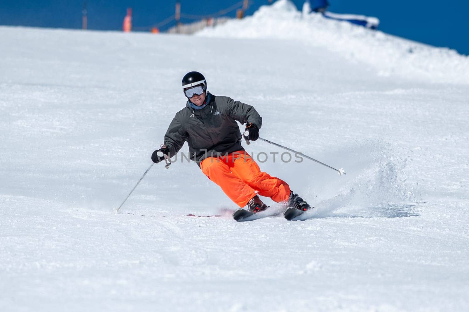 Skier on the slopes of Grandvalira in Andorra in winter 2024. by martinscphoto