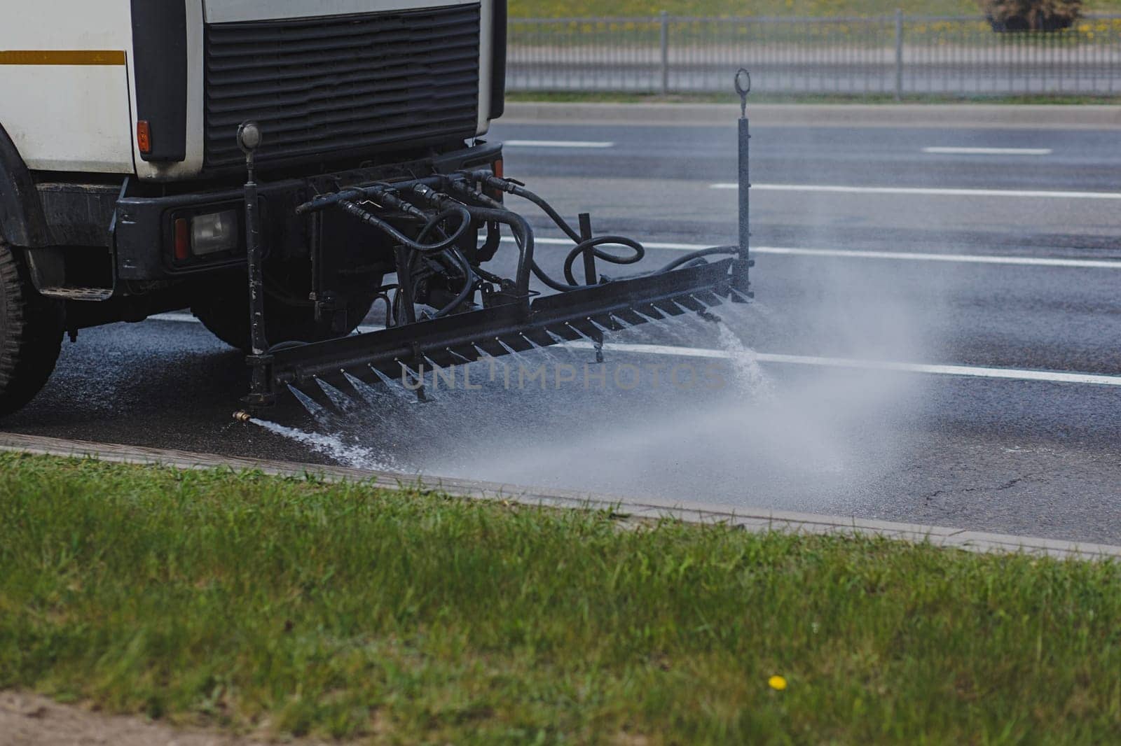 truck clears the city of dust and dirt. prevention of the coronavirus pandemic