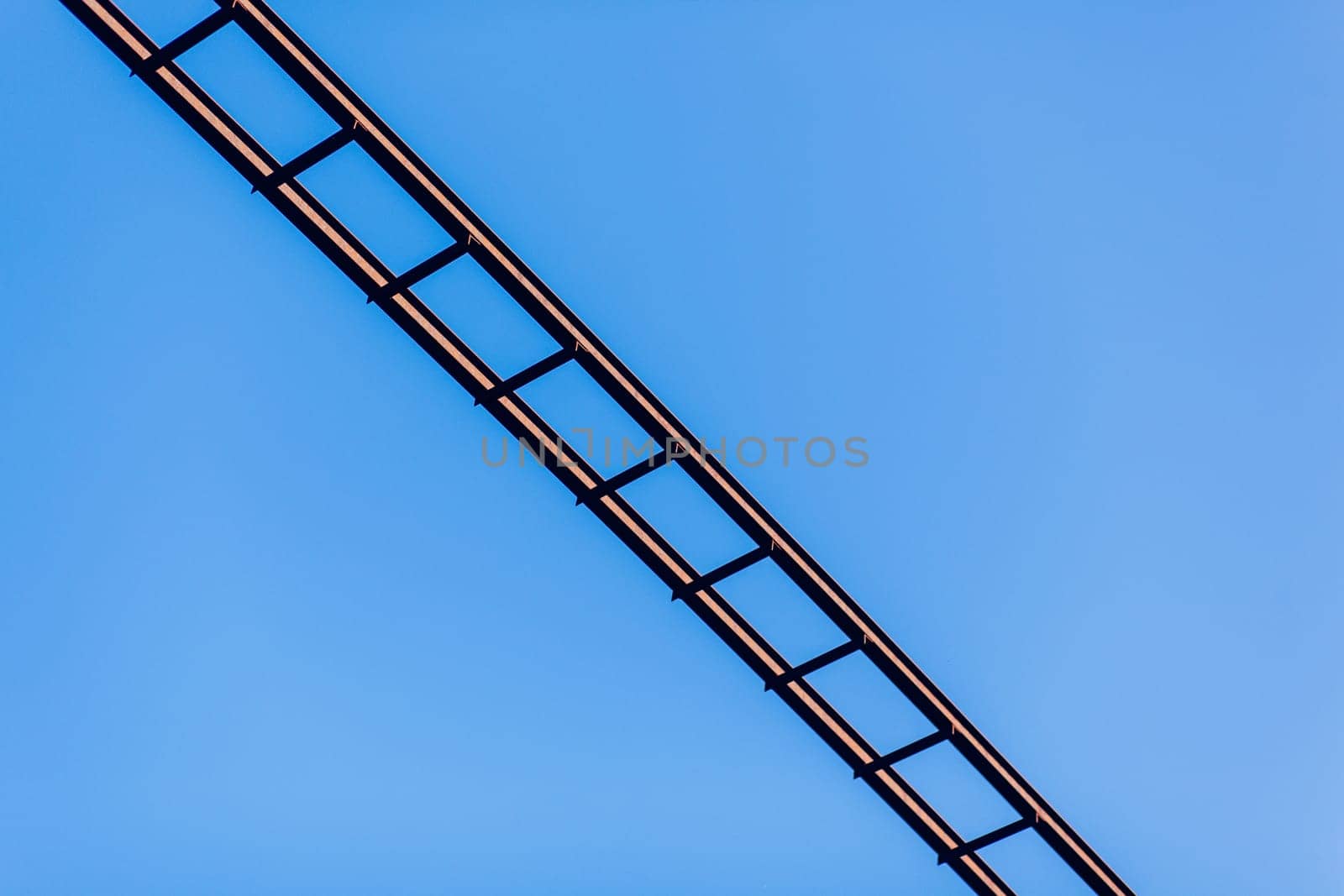 Staircase against blue sky. Development motivation career growth concept