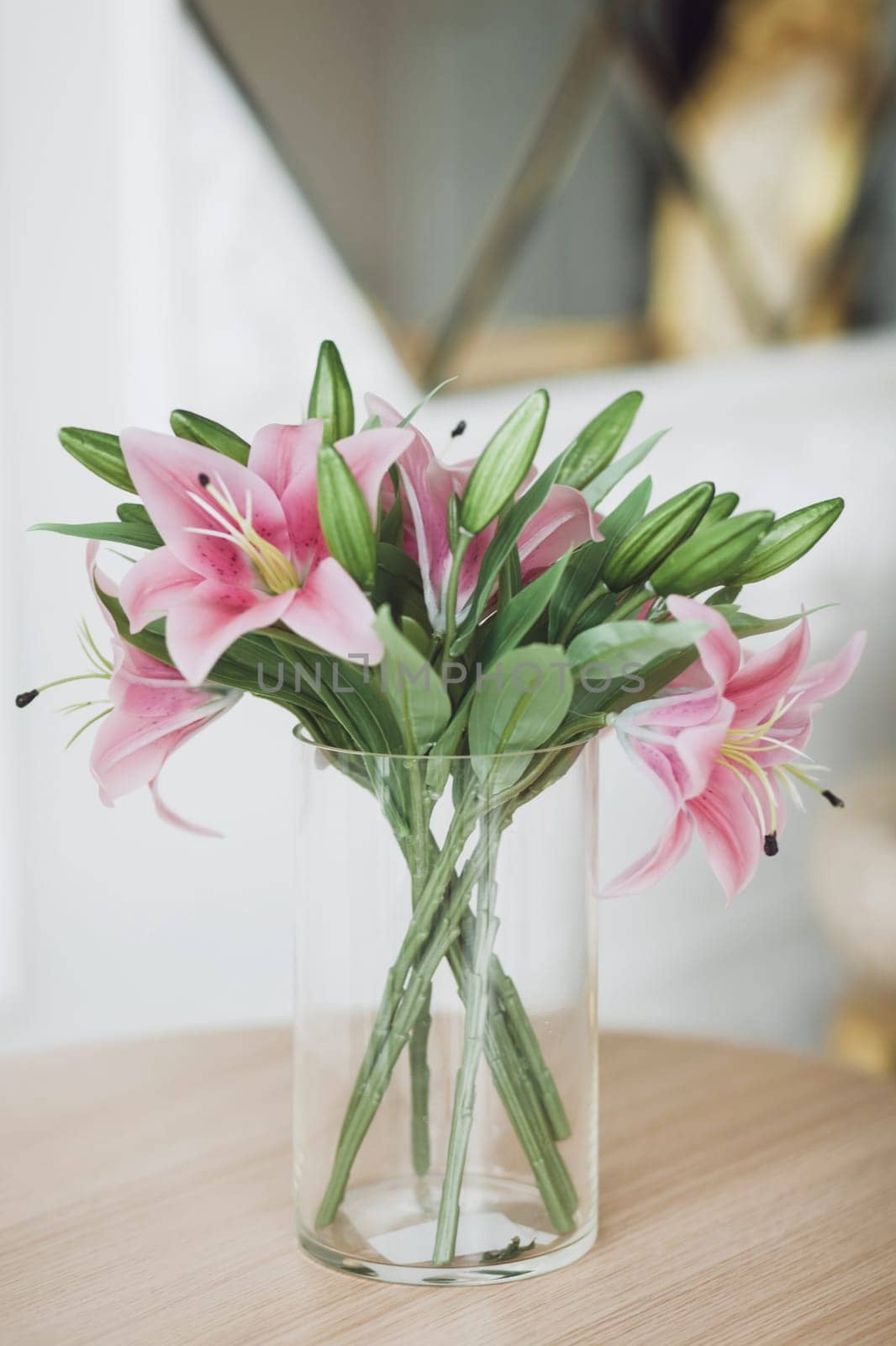 Bouquet of flowers in glass vase on table