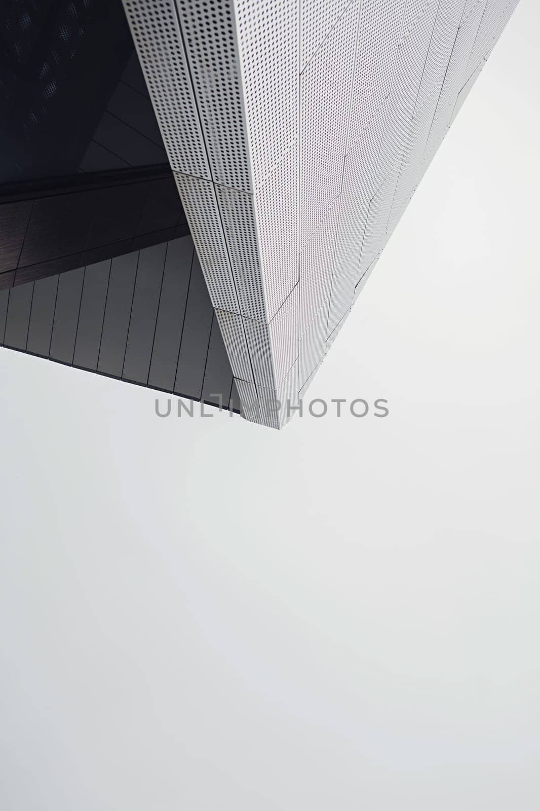  Modern architecture fragment with shadows. Abstract black and white background with circles pattern.