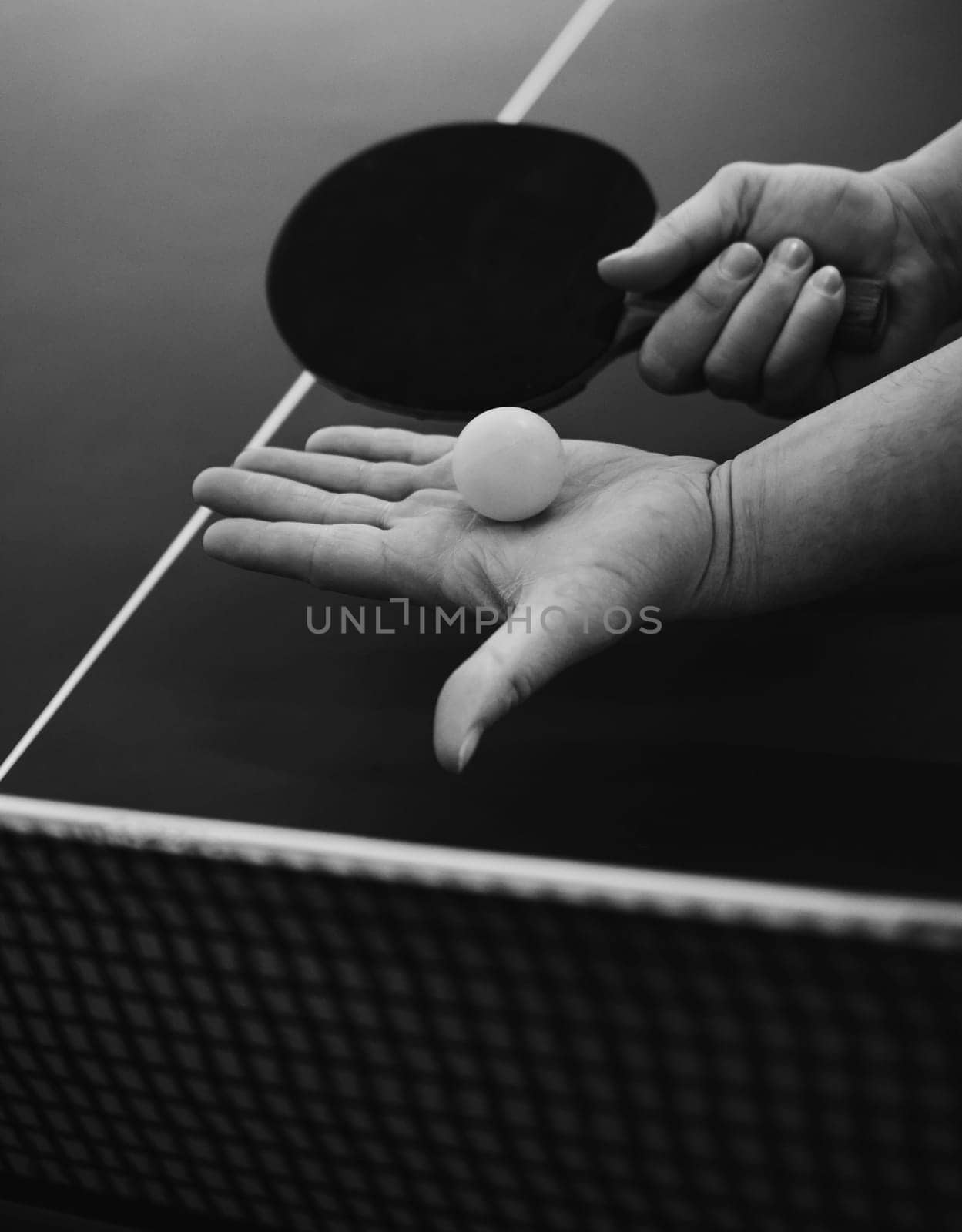 table tennis player serving, closeup. ping pong