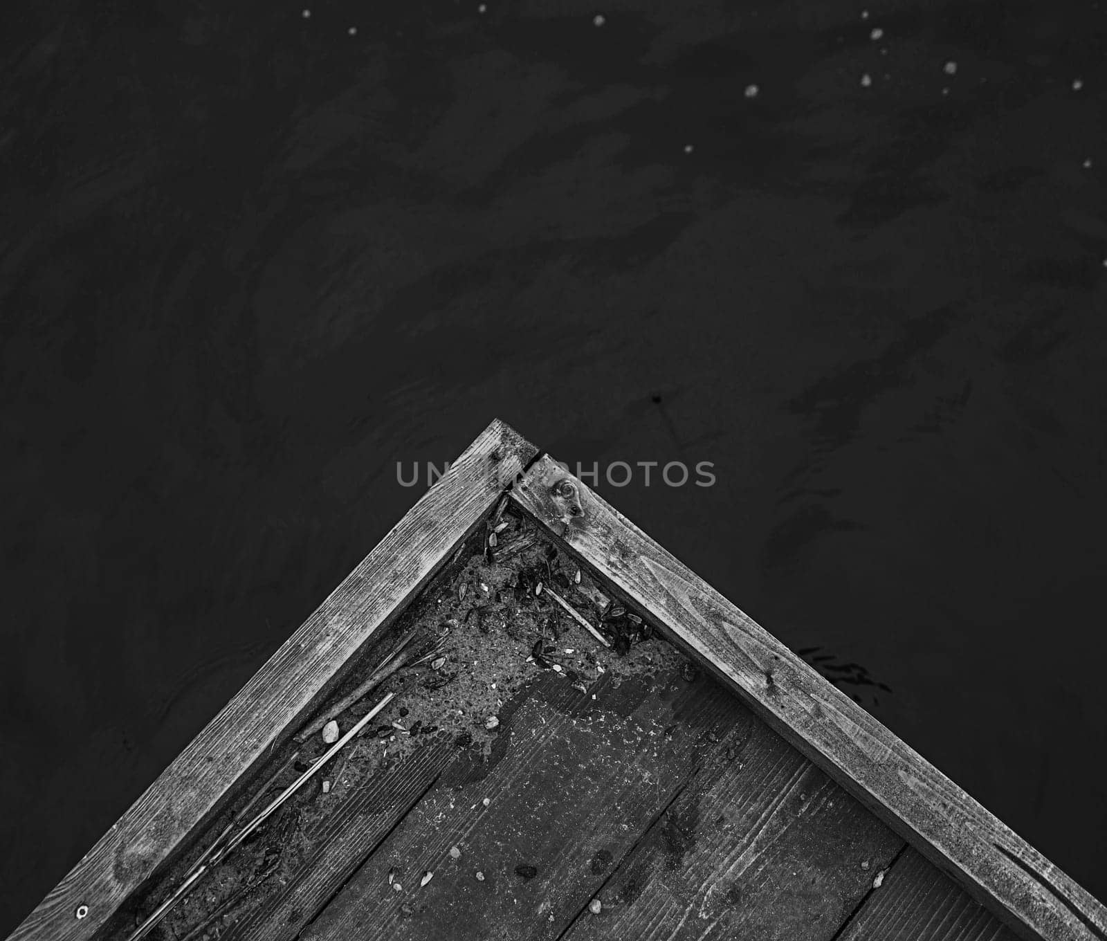 corner of the old wooden pier on the sea. texture