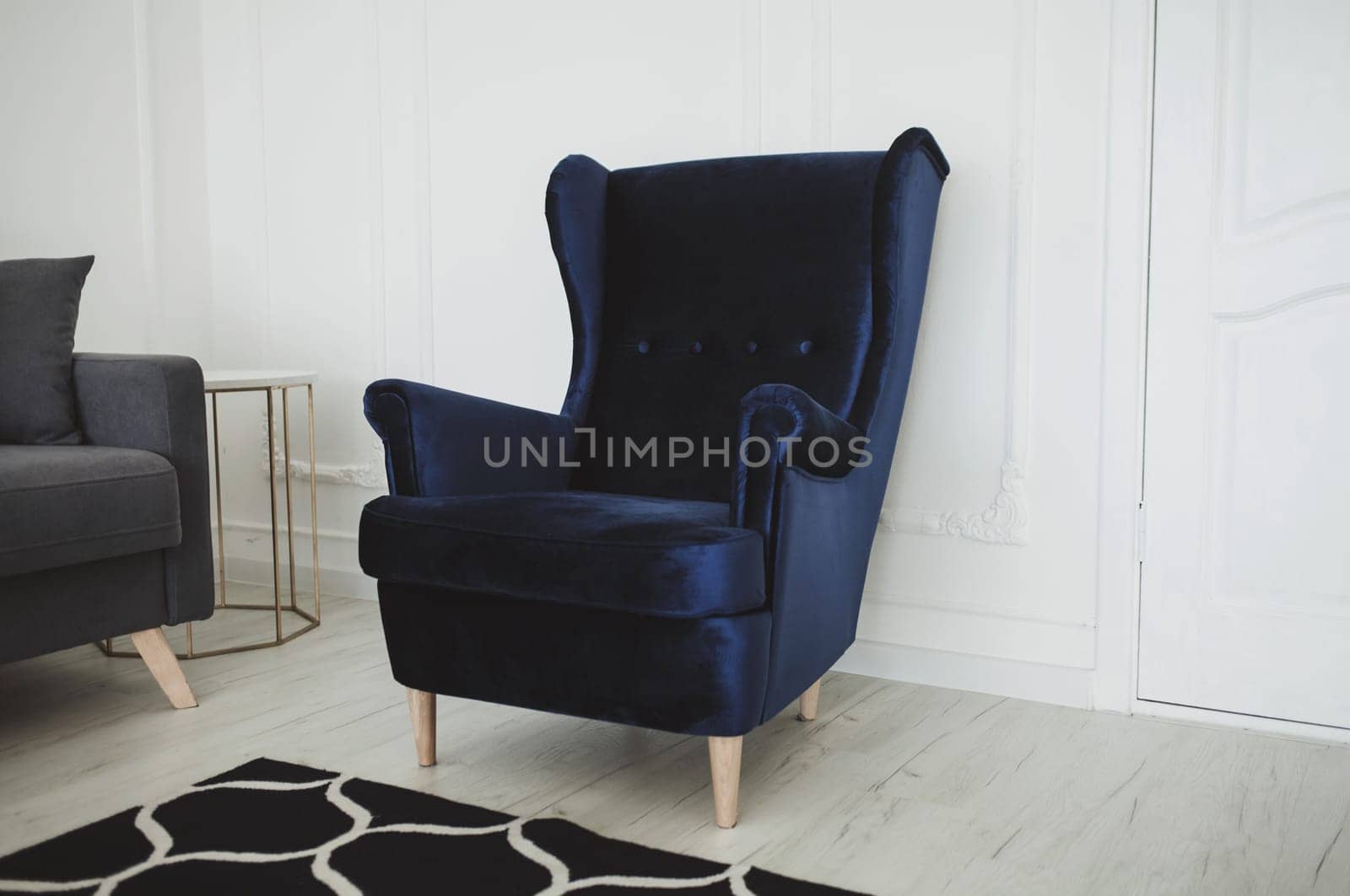 Beautiful living room with armchair by Ladouski