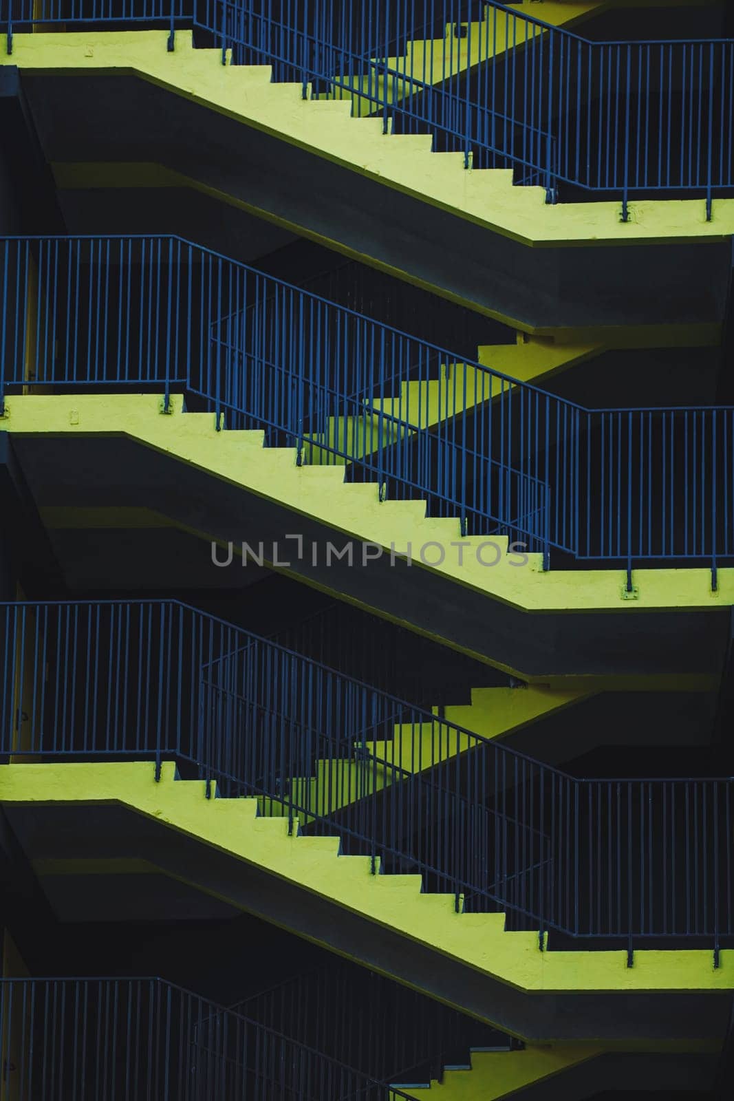  Yellow stairs, fire escape ladders, mall parking stairs