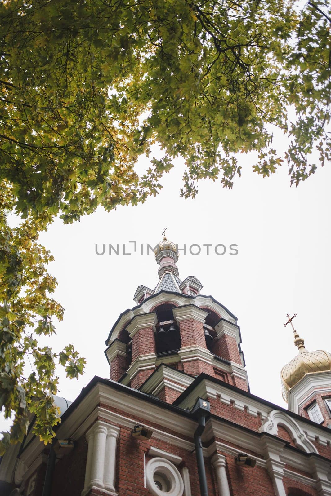 old brick Church in Europe. autumn picture