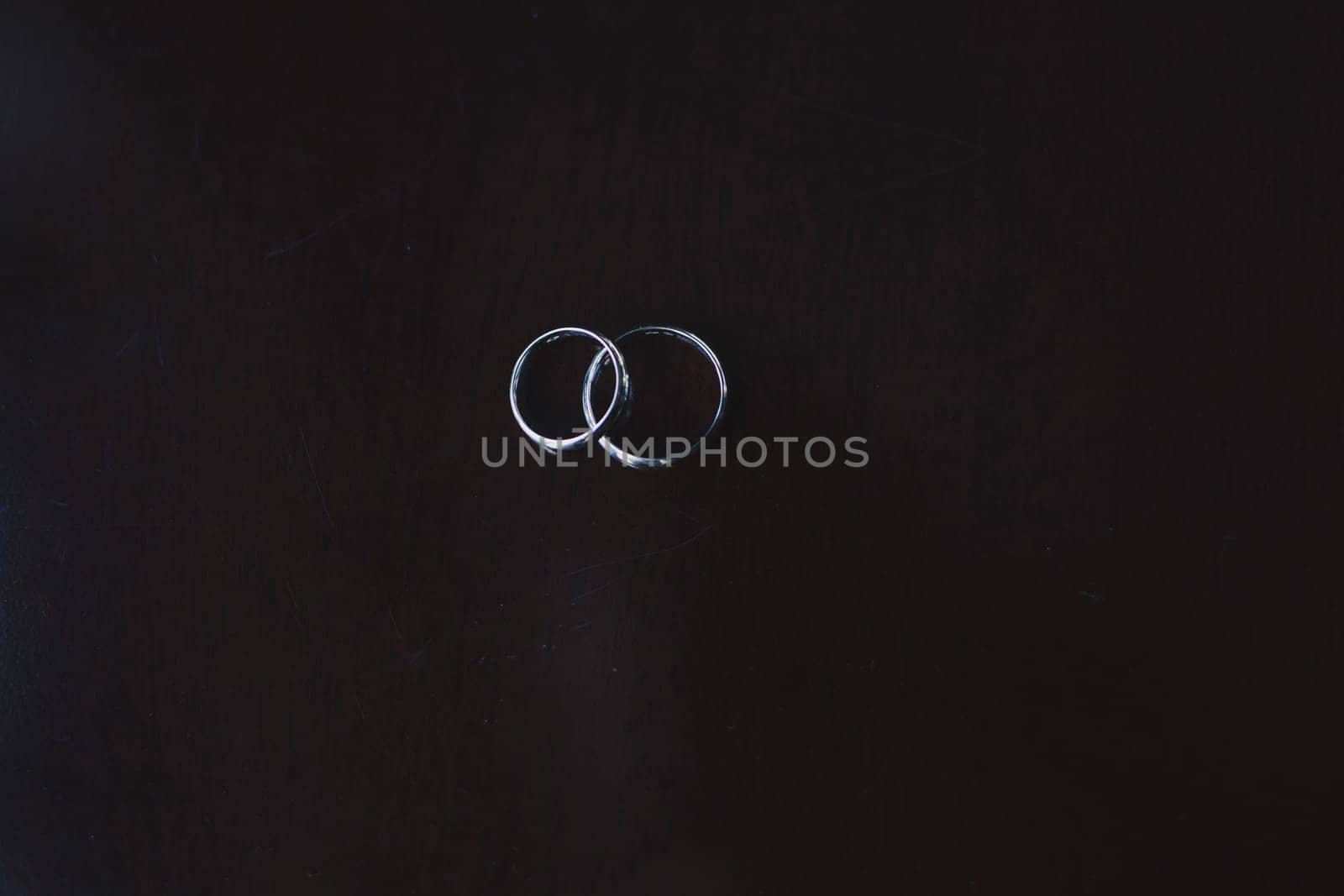 Wedding rings on table. Two Wedding rings for the bride and groom.