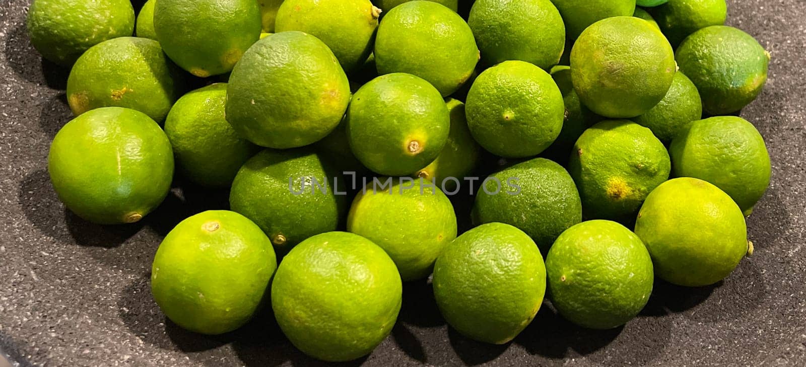 Lime Citrus Fruits In Fruit Market good as your content background