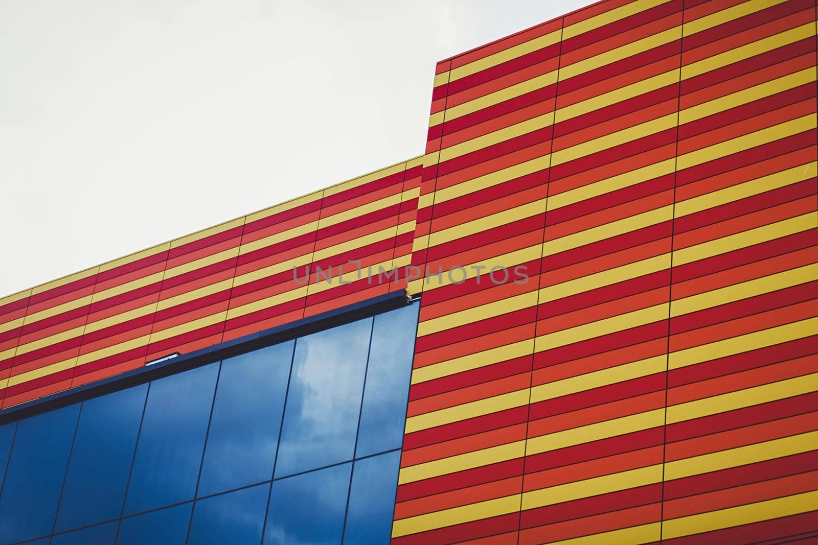 Modern office building with a window against the sky