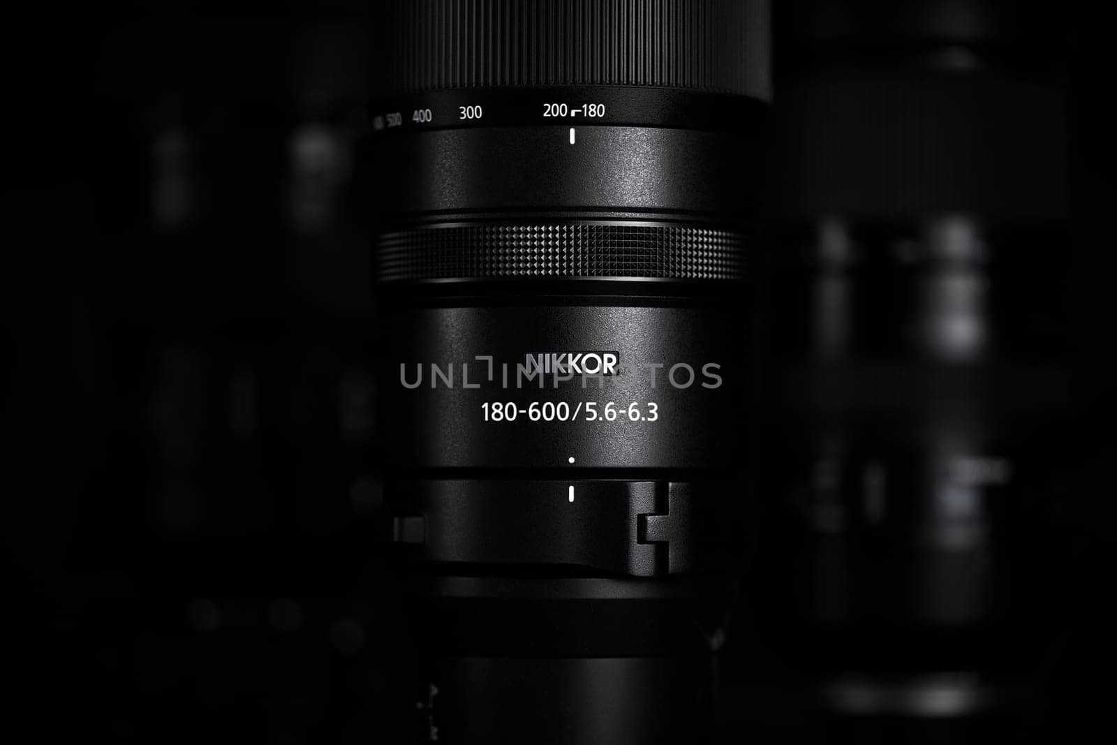 Super telephoto lenses on a blurred background. The NIKKOR Z 180-600mm f 5.6-6.3 VR in the foreground. Professional photo and video optical lenses for digital camera. 20.02.2024, Yerevan, Armenia by EvgeniyQW