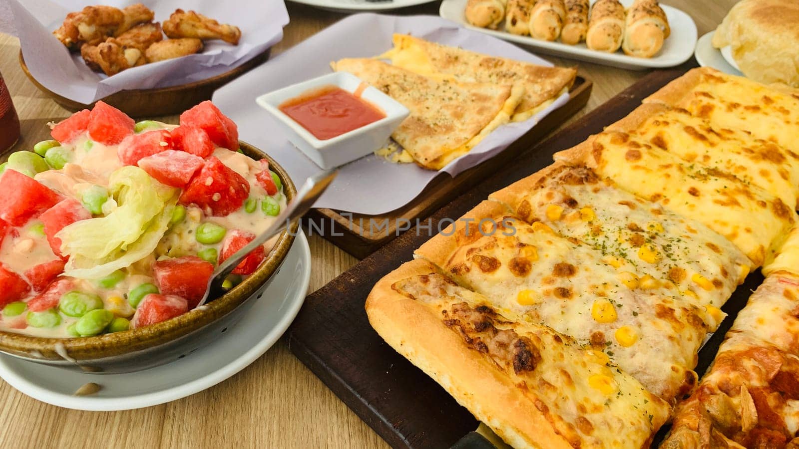 Homemade square pizza with cheese on wooden table Square pizza - Four seasons - Organic pizza - Vegan healthy pizza - Vegetables pizza