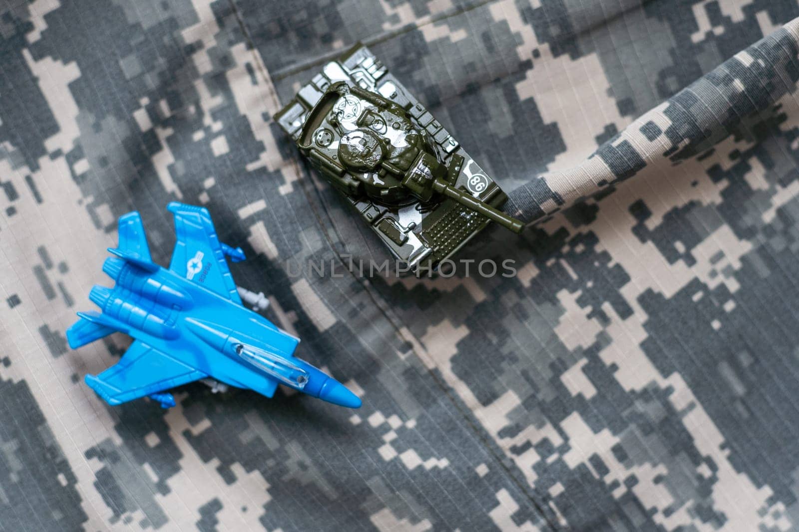 Miniature model of military tanks. Russian War of Ukraine War Concept. High quality photo