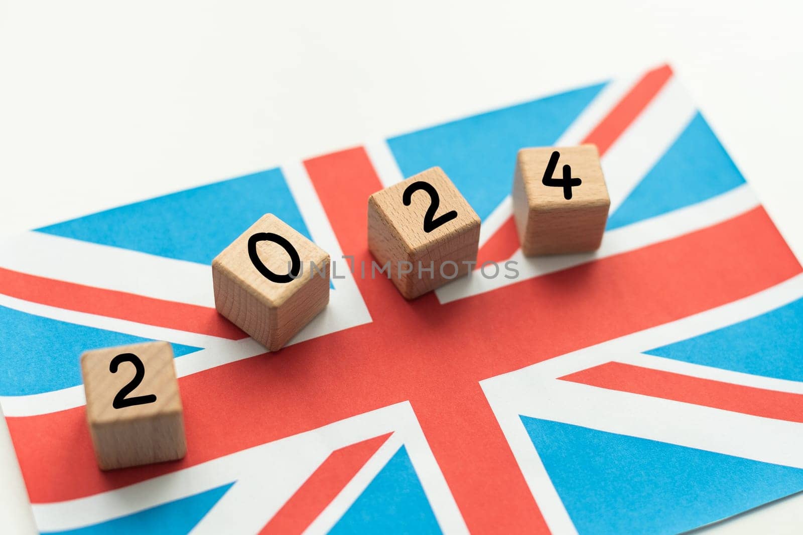 2024, United Kingdom, United Kingdom flag with date block, Concept, Important events for UK in the new year, election, economy, social activities, central bank, UK foreign policy. High quality photo