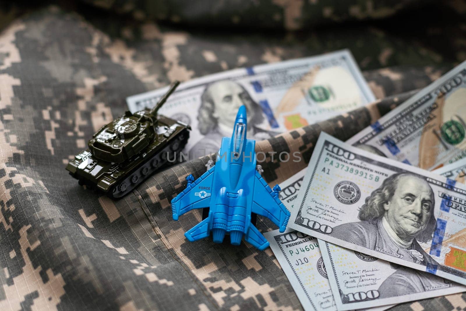 tank against the background of dollars. Concept of war. High quality photo