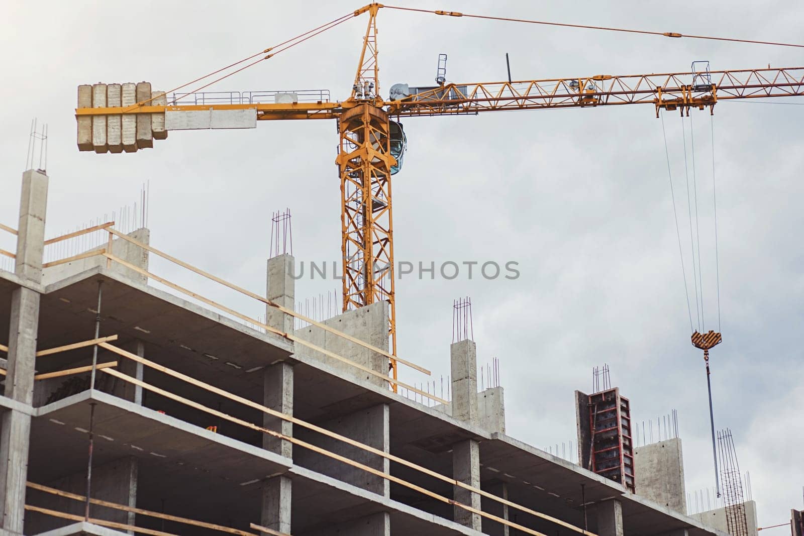 construction site with crane for new home