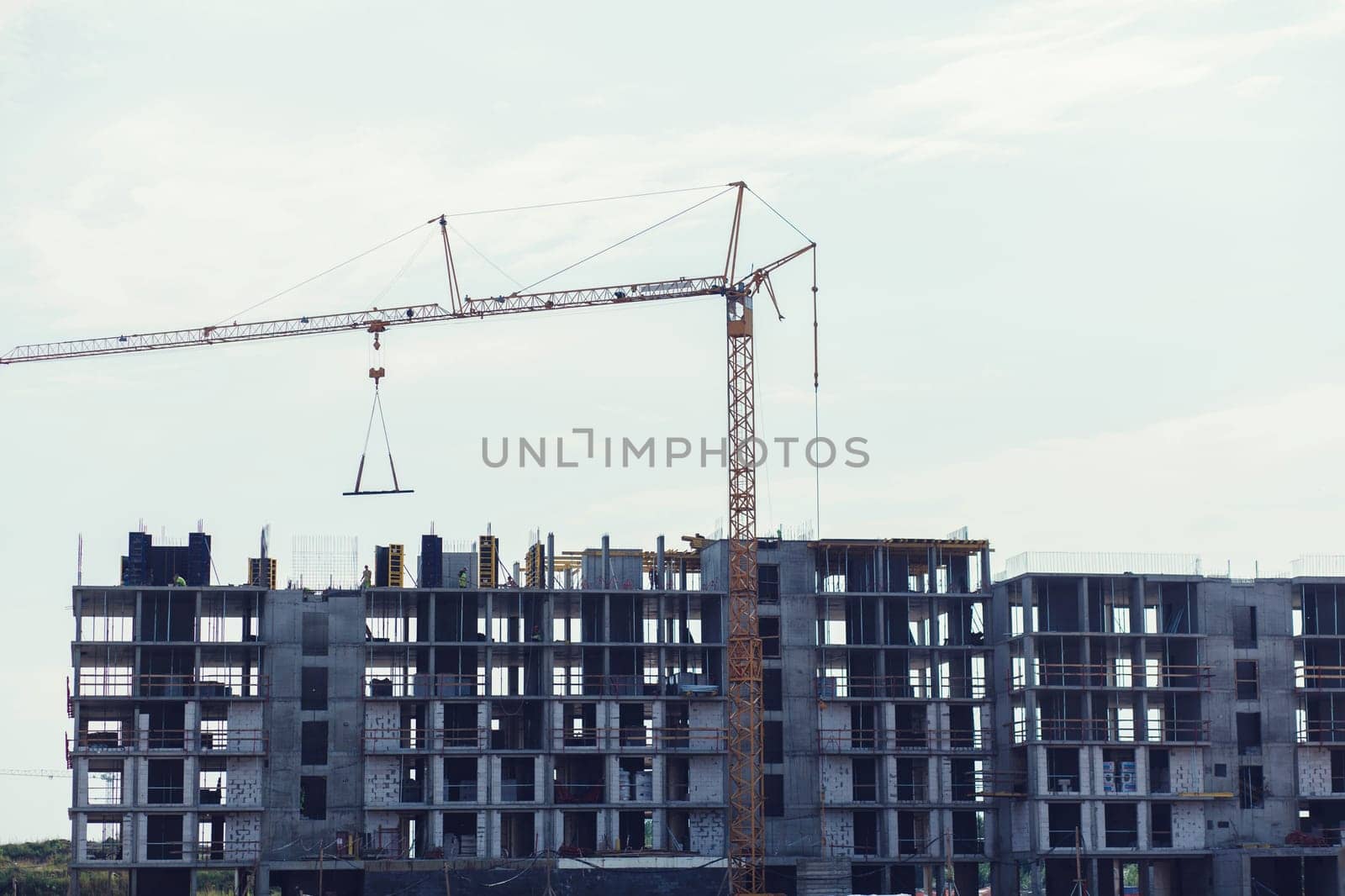 Crane on the construction site of the new house