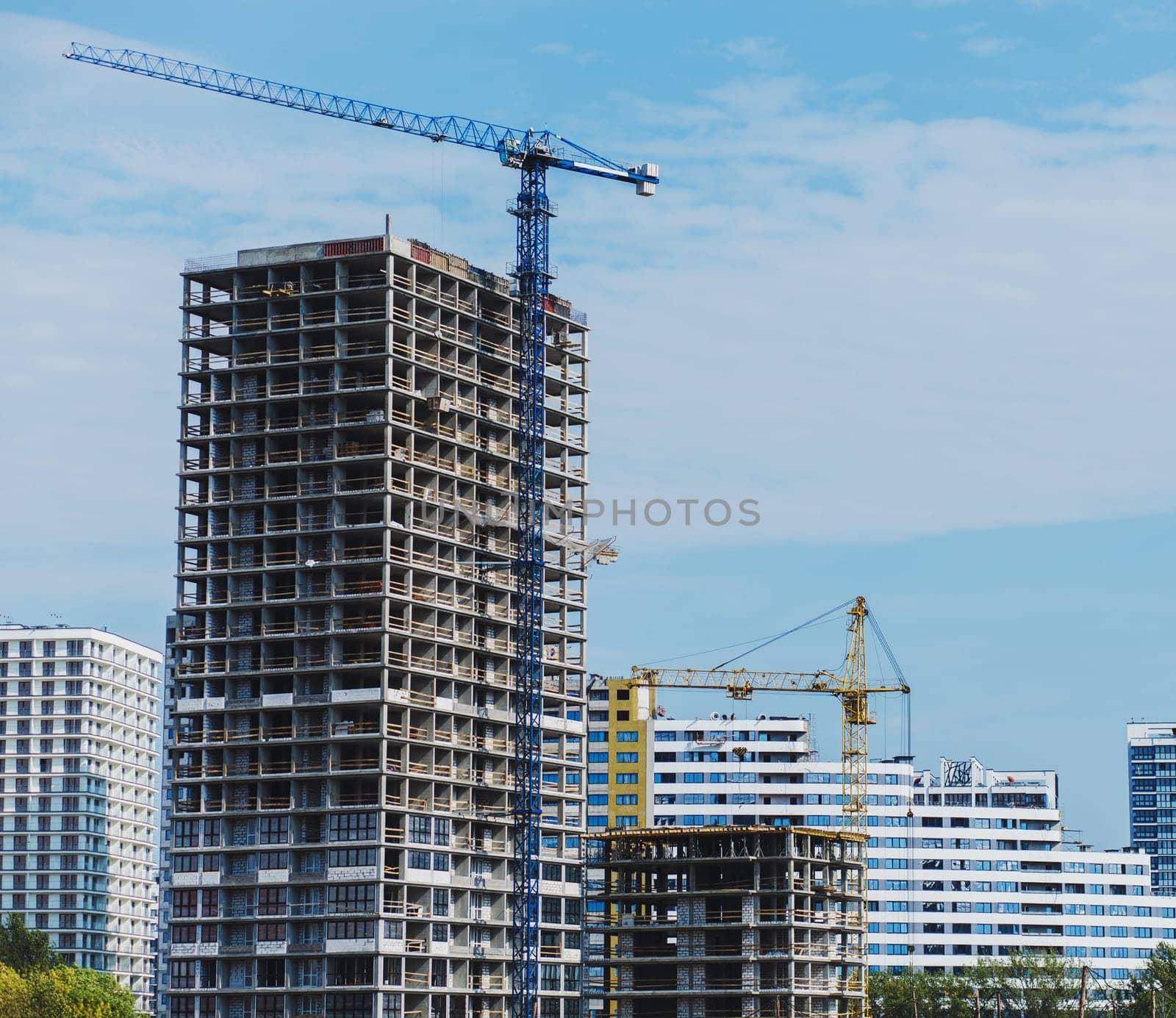 construction site with cranes in the new residential center