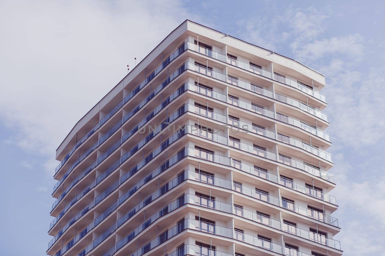 Minsk, Belarus- August 2019: apartment buildings with a blue sky. Facade of a modern apartment building 