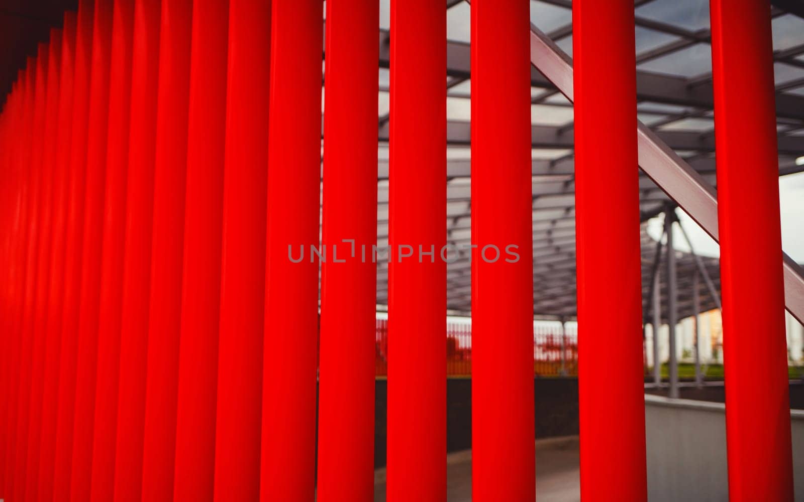 red facade of the building made of metal strips
