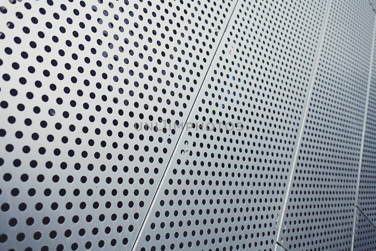 shiny metal panel or texture with circles