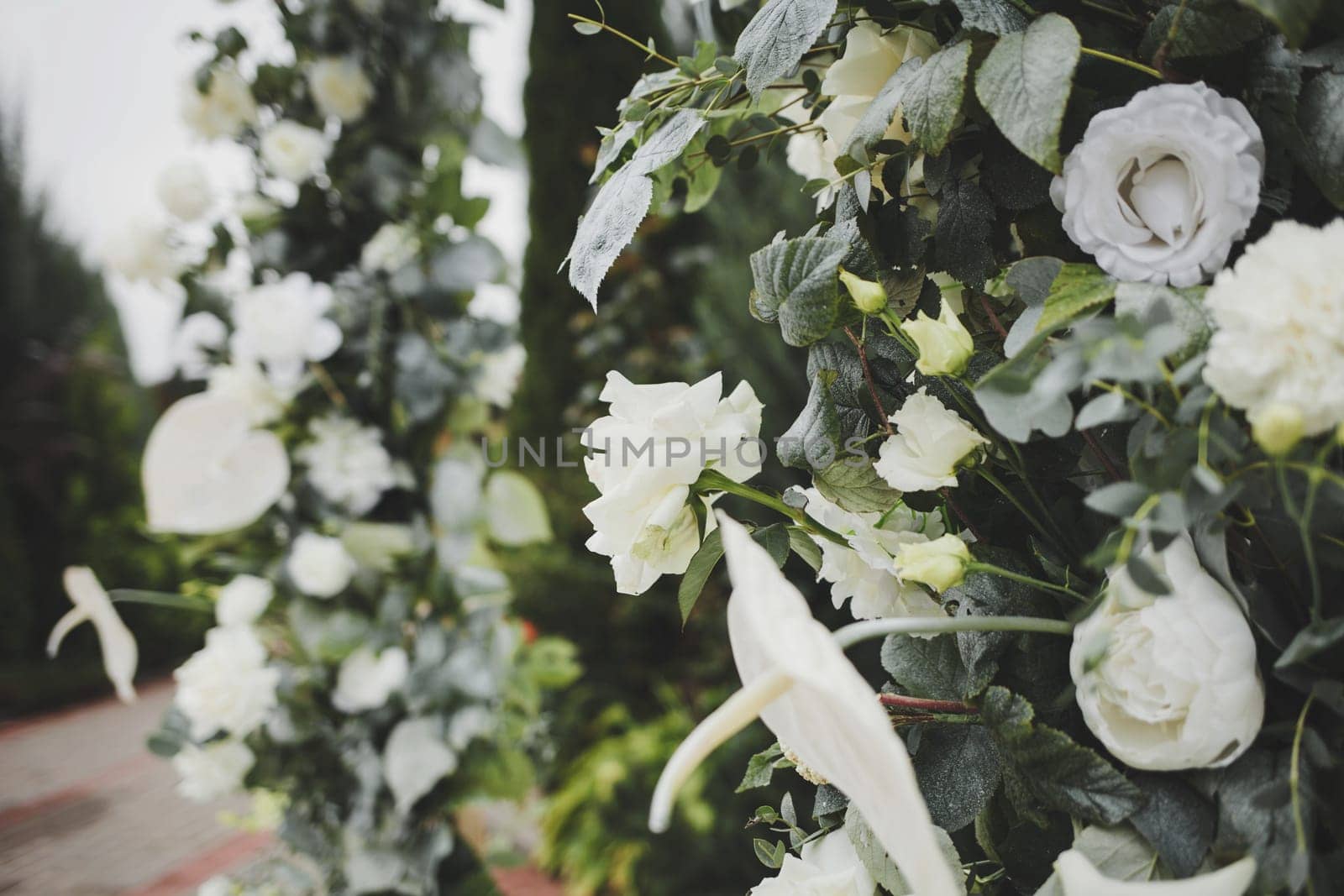 Floral wedding decoration-arch of flowers.