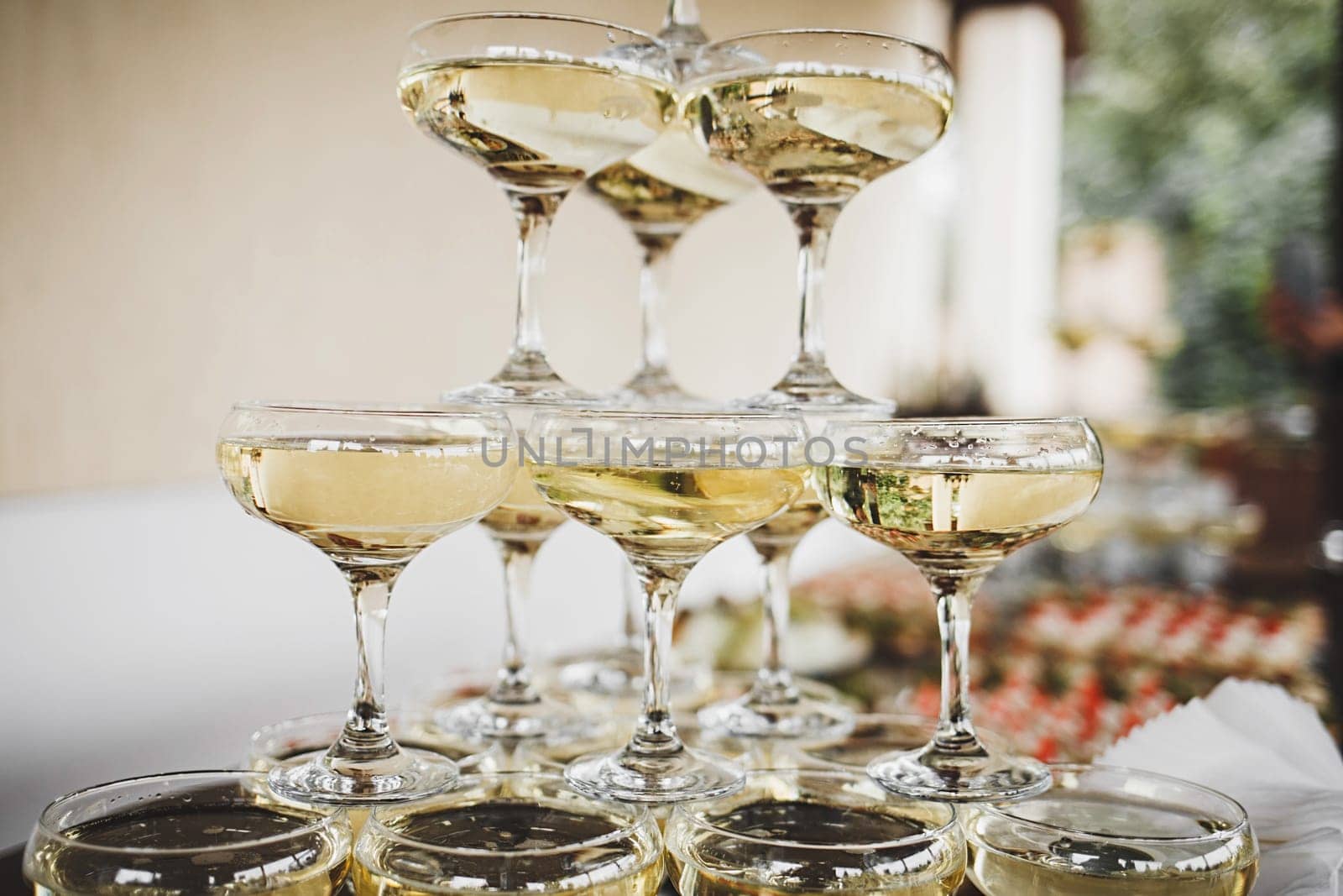 pyramid of wine glasses at the festival. wedding or new year