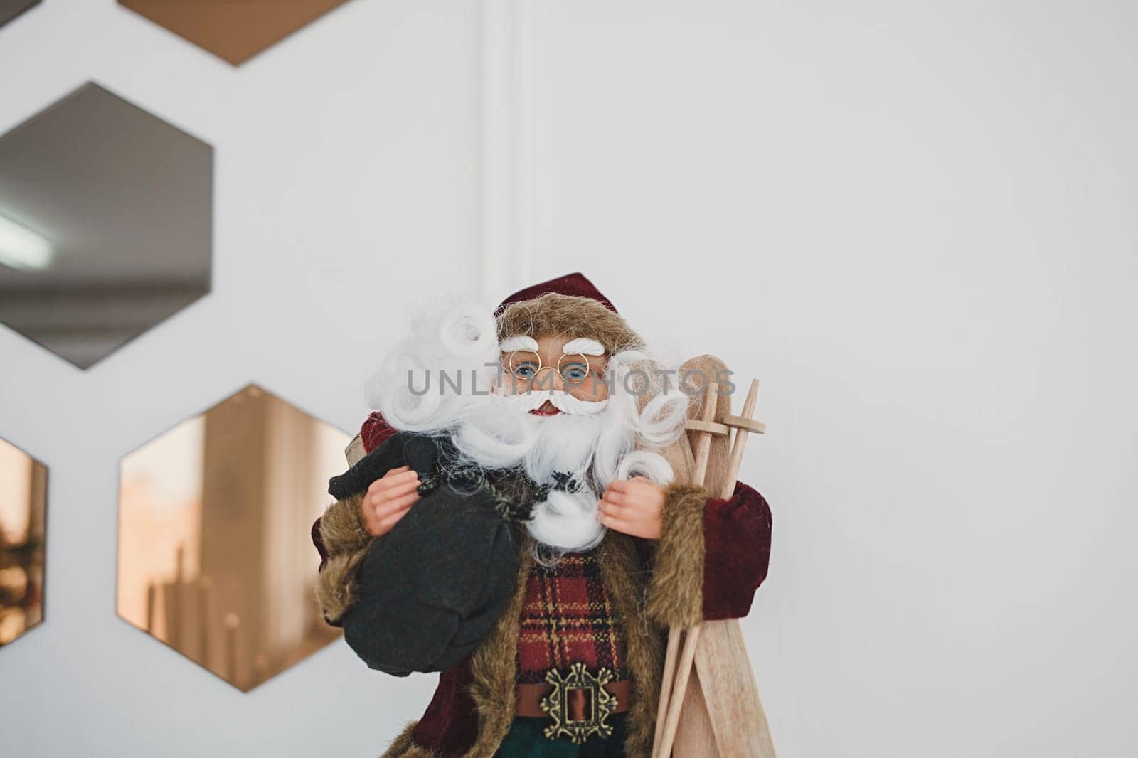 fabric santa claus christmas decoration in room 