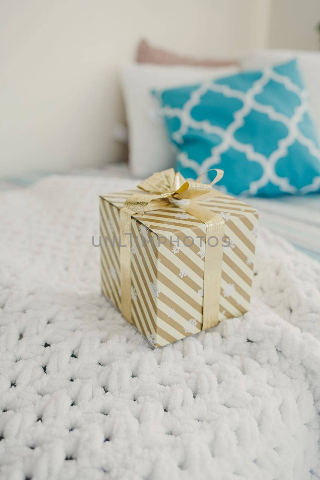 gift box with ribbon in room. christmas season