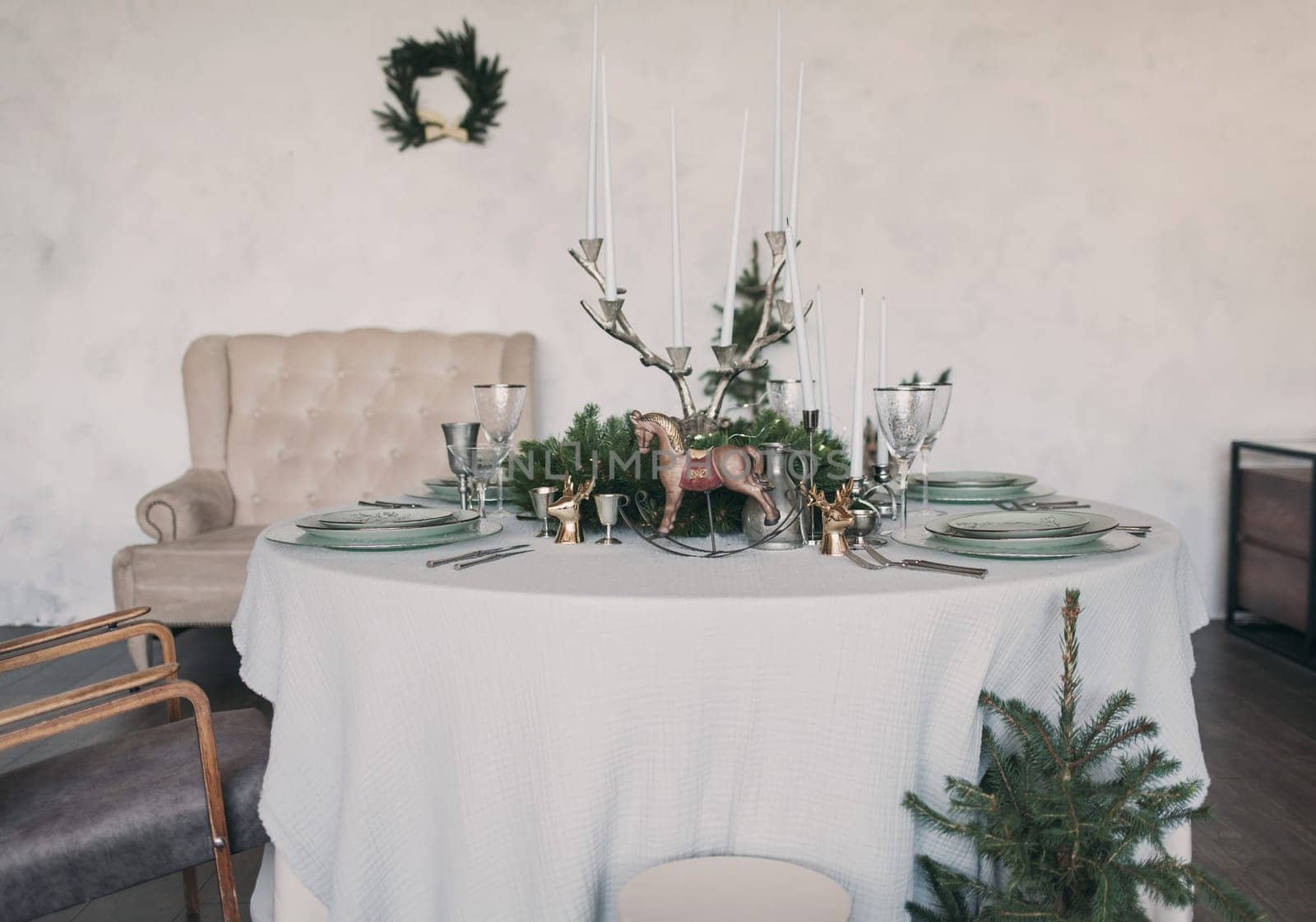 Beautiful table setting for Christmas dinner. Festive atmosphere