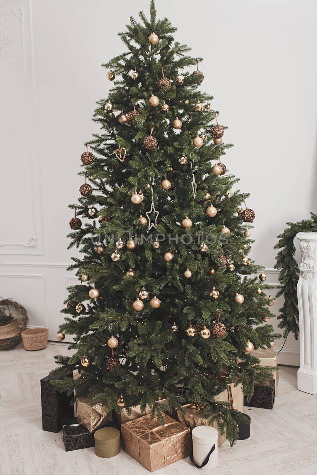 beautiful Christmas tree decorated with balls and garlands