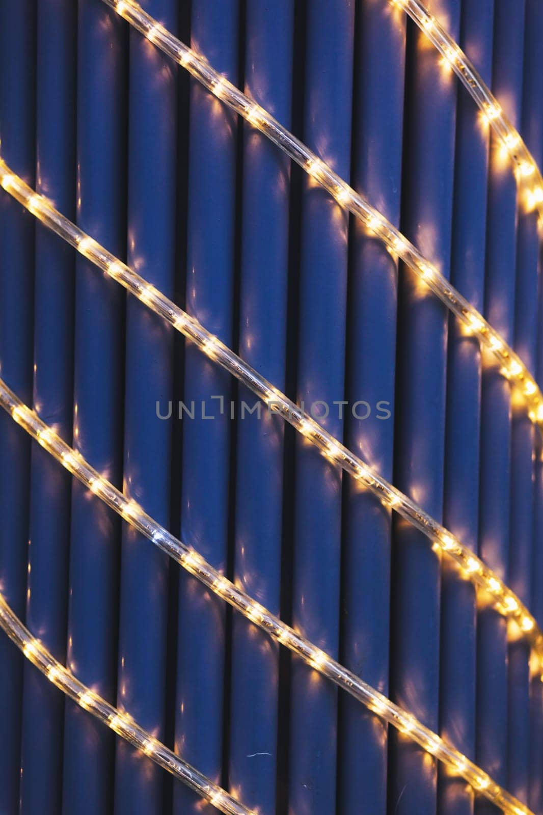 Christmas garland on the pillar of the city. night scene
