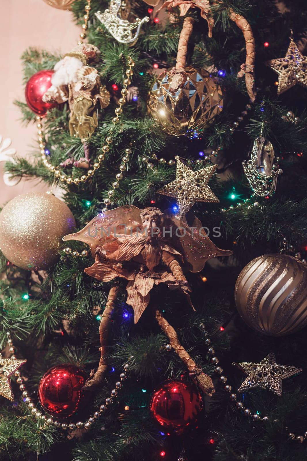 Christmas tree is decorated with garlands. new year