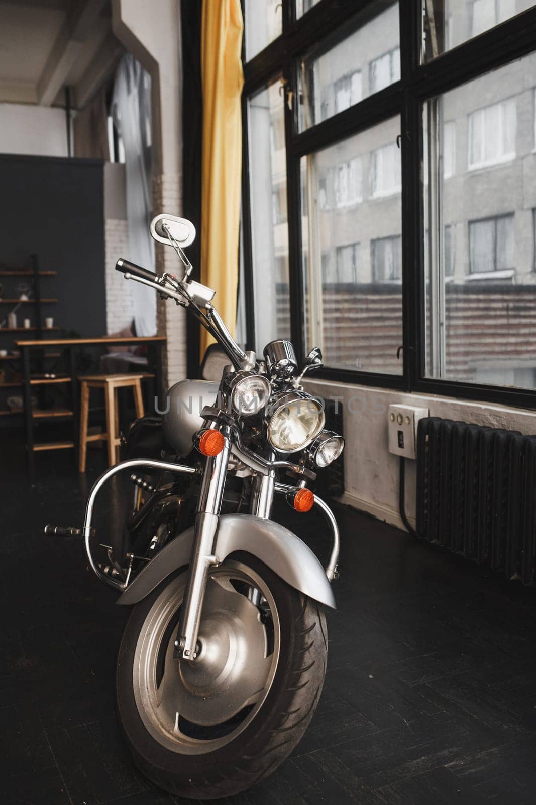 Vintage style motorcycle in customs garage