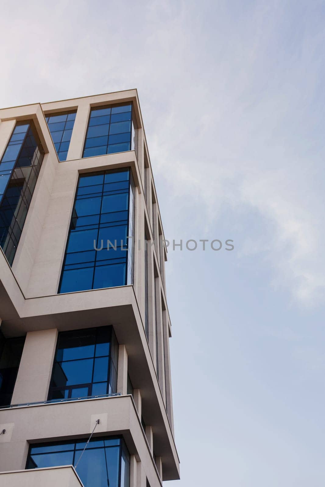 glass architecture against the sky. modern bank or office building