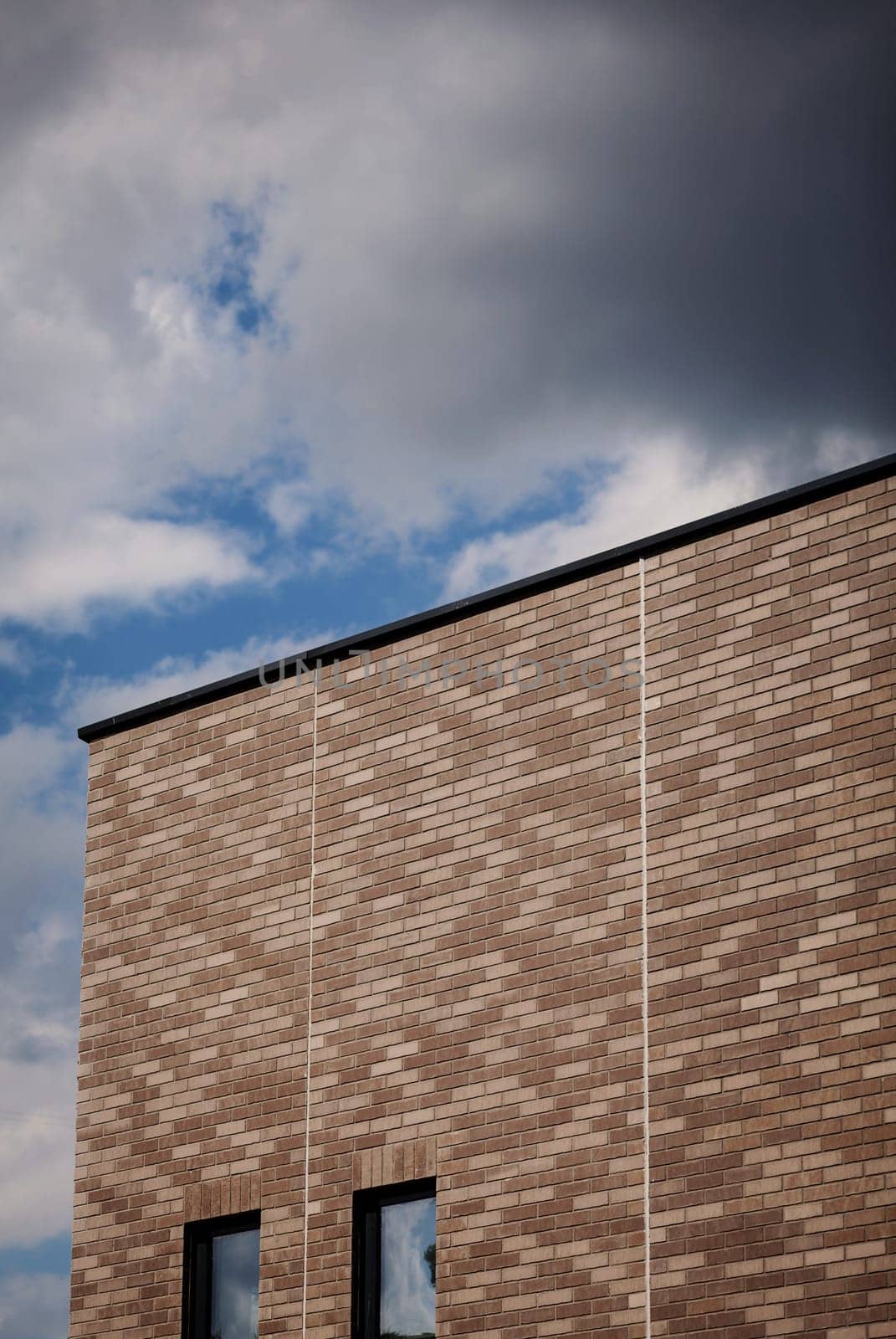 Modern bricks building with sky background