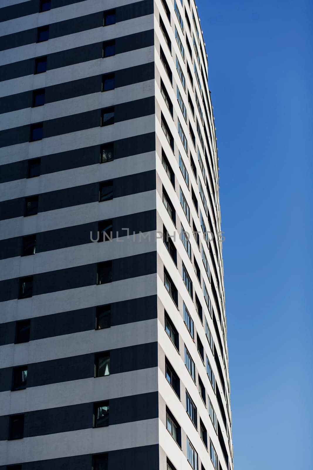 modern residential building on the background of the blue sky. mortgage