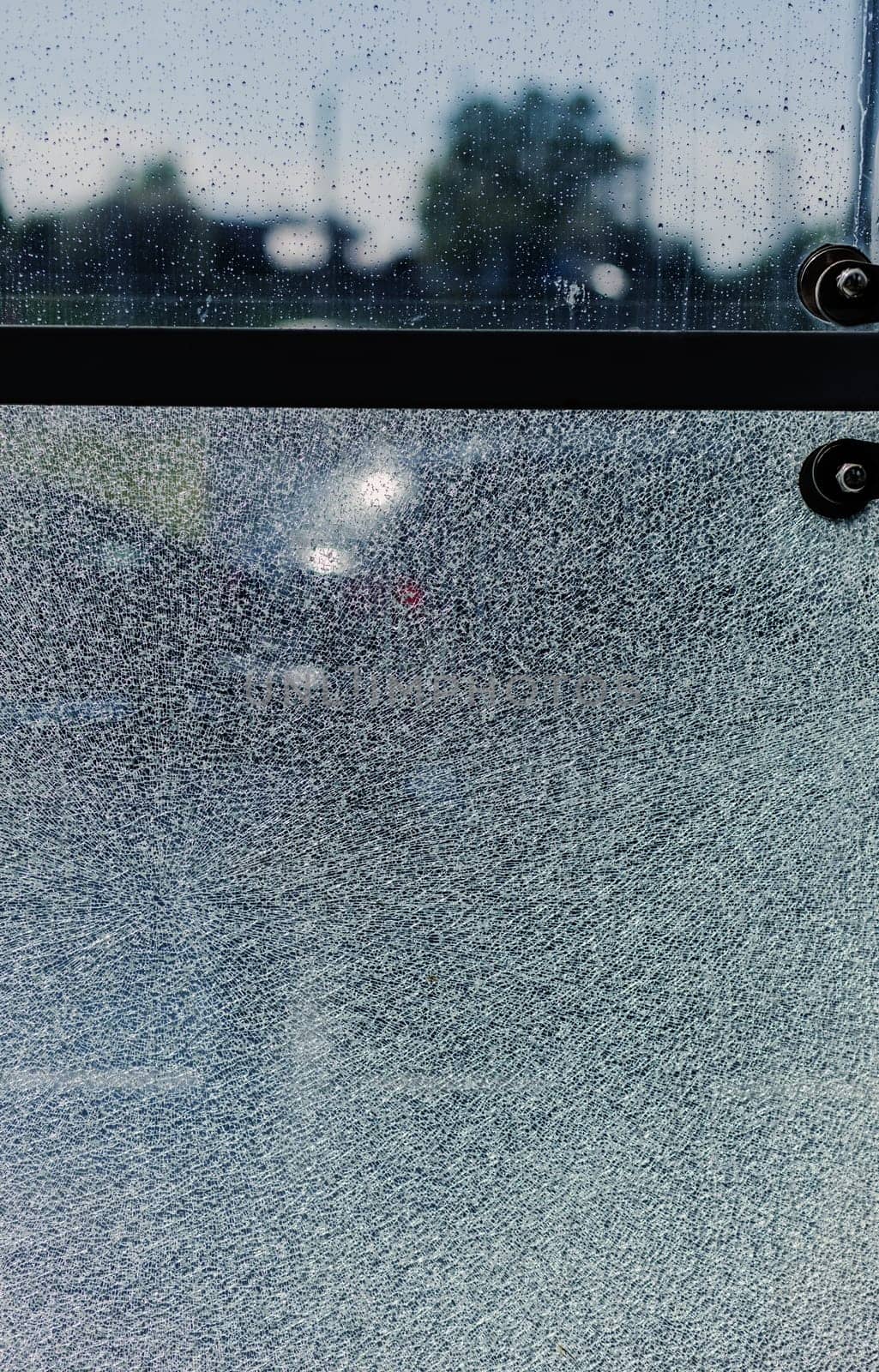 broken glass, background of cracked window. vertical photo