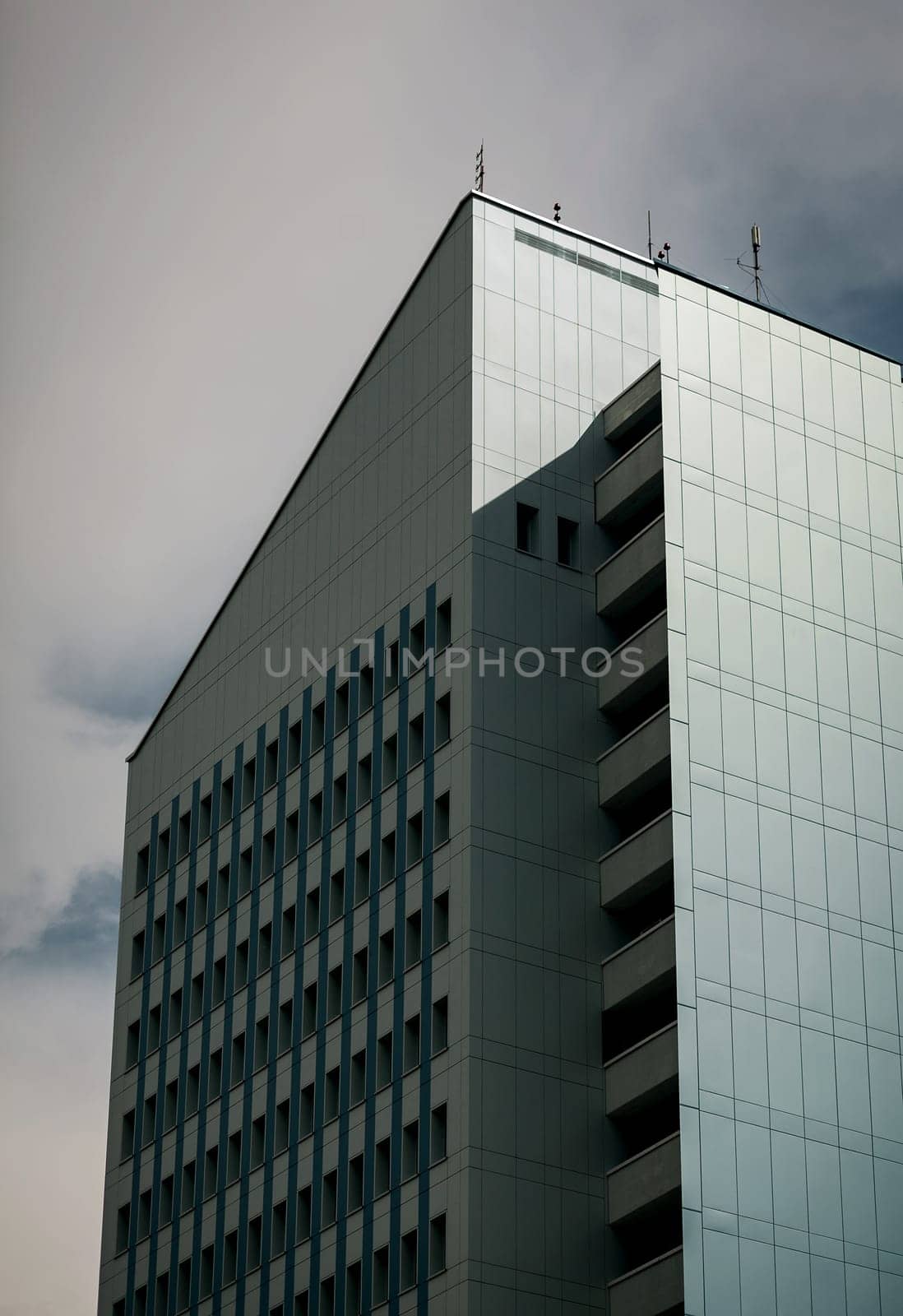 modern office building against sky background
