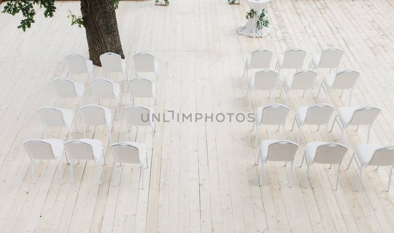 stylish white chairs. Luxury decor for the wedding ceremony.