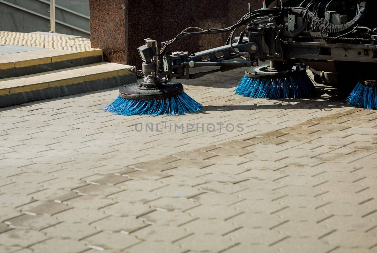 Sweeper machine cleaning. Concept clean streets from debris.