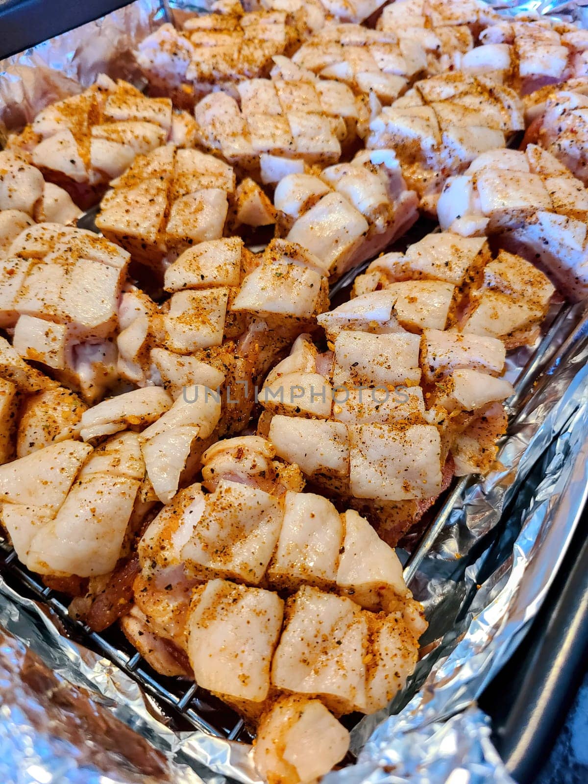 Seasoned Raw Pork Belly Prepped for Home Cooking in Indiana, Ideal BBQ Recipe for Father's Day 2022