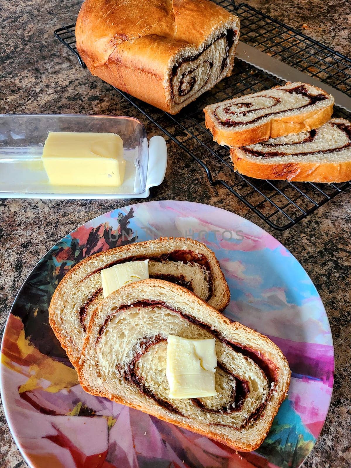 Freshly baked cinnamon raisin swirl bread ready to be served, embodying the warmth of home cooking in Fort Wayne, Indiana, 2021