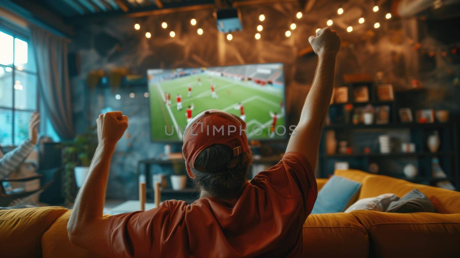 A group of people are sitting on a couch watching a soccer game on a television AIG41 by biancoblue