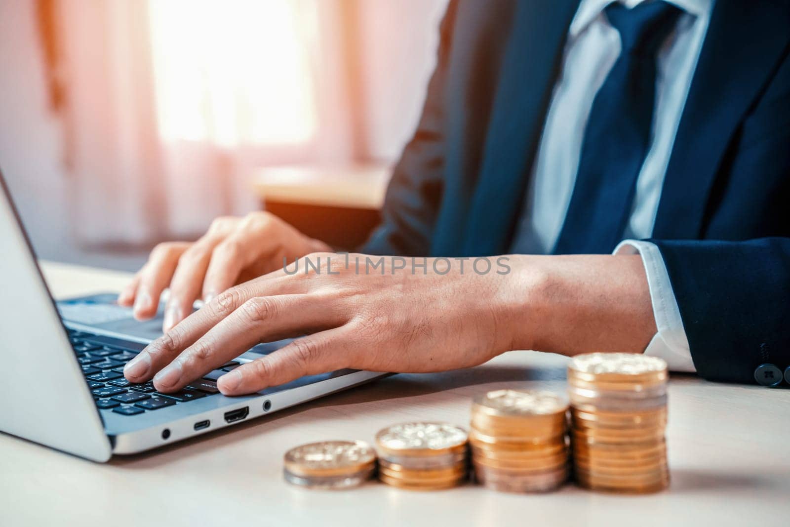 Businessman working with coin money currency. uds by biancoblue