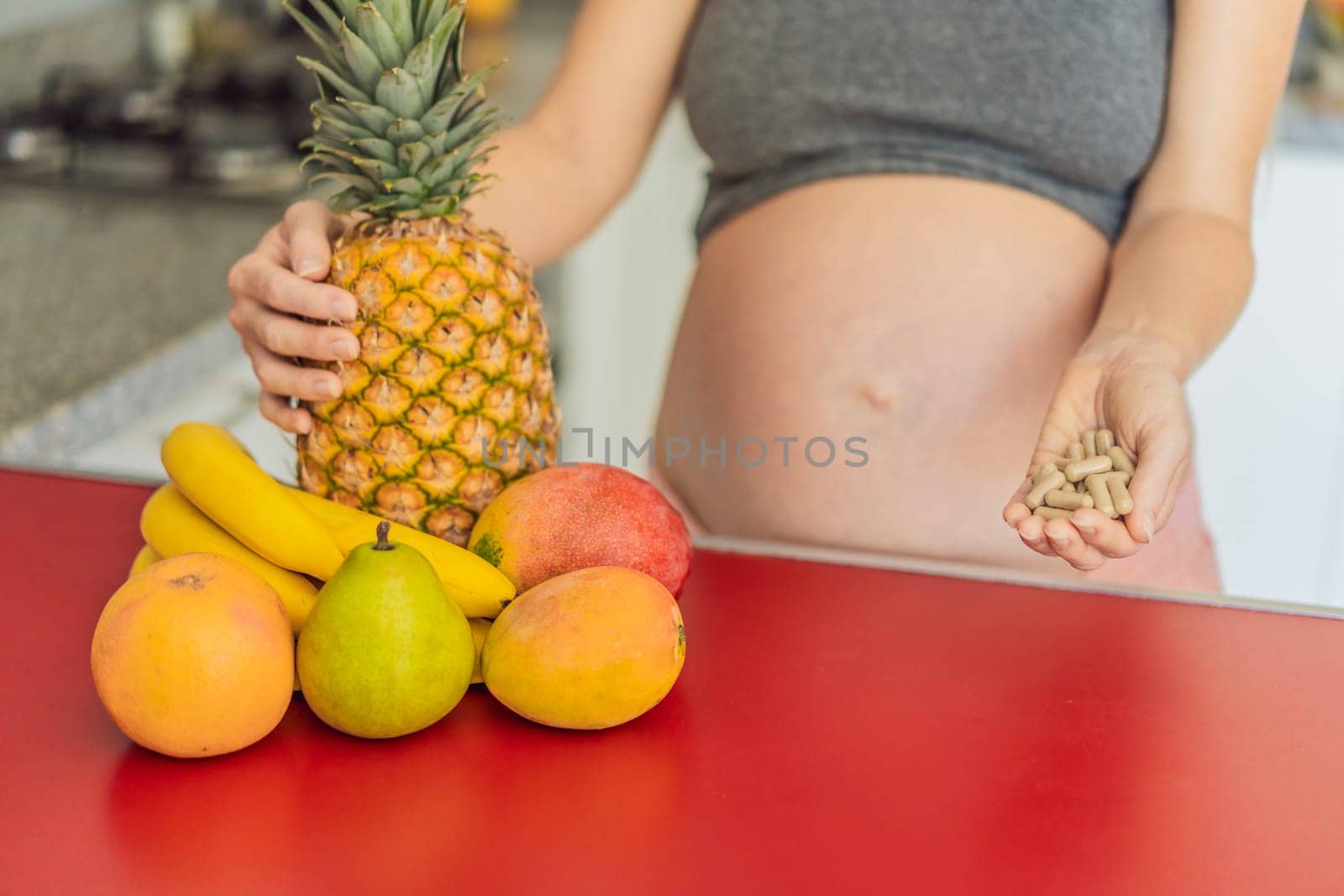 Balancing choices for optimal nutrition, a pregnant woman decides between the wholesome goodness of fresh fruits and the convenience of vitamin tablets, ensuring a well-rounded approach to her prenatal health by galitskaya