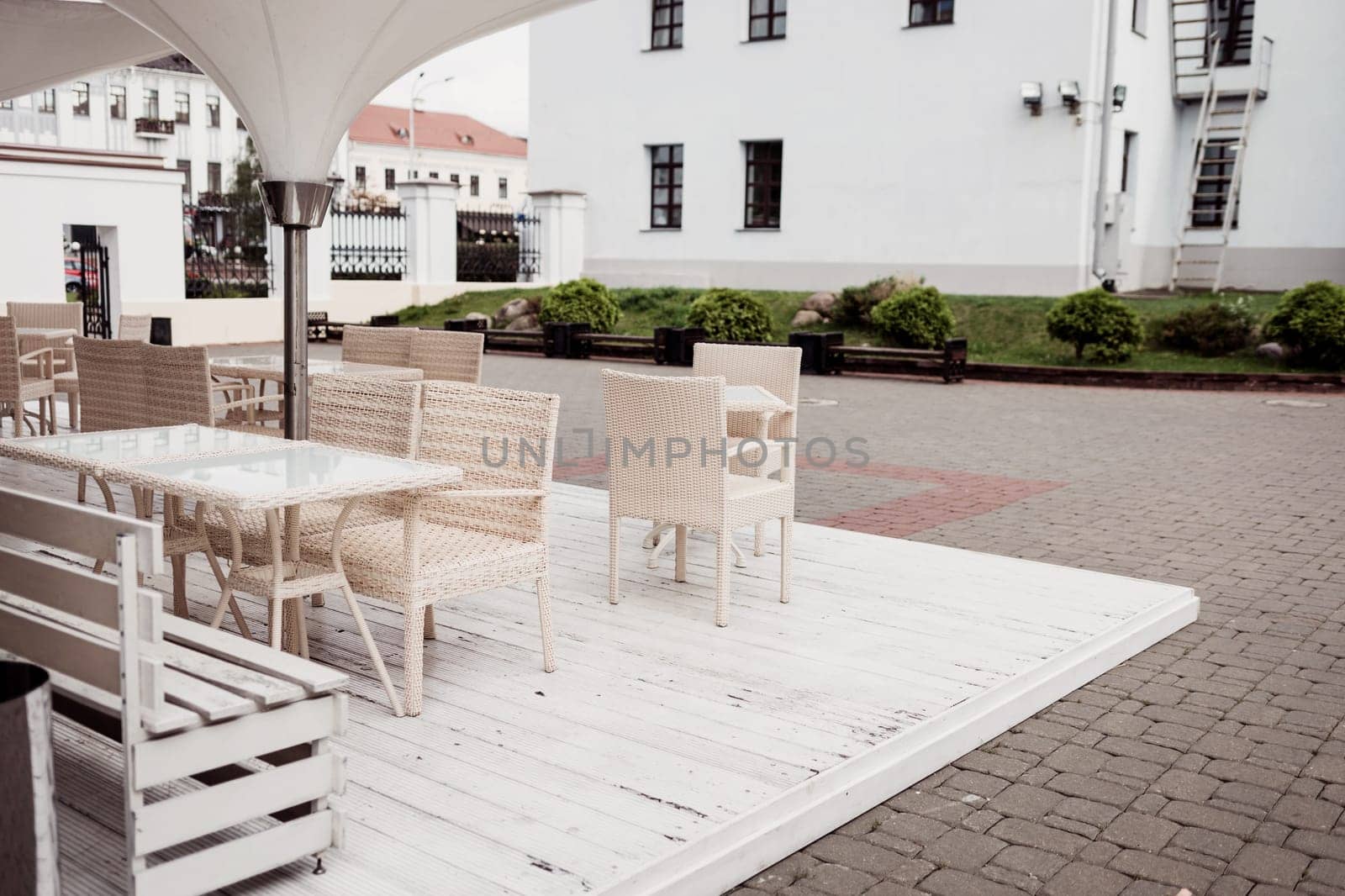 cozy outdoor cafe (bistro) with wicker furniture