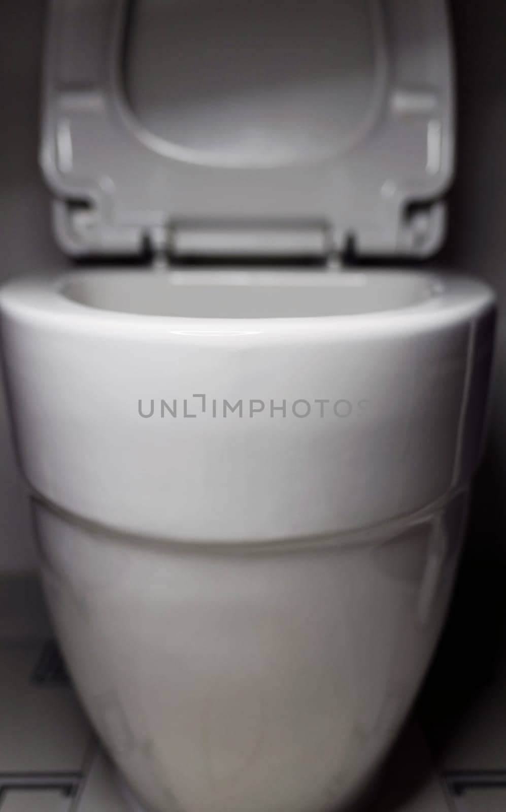 New white toilet bowl in a bathroom