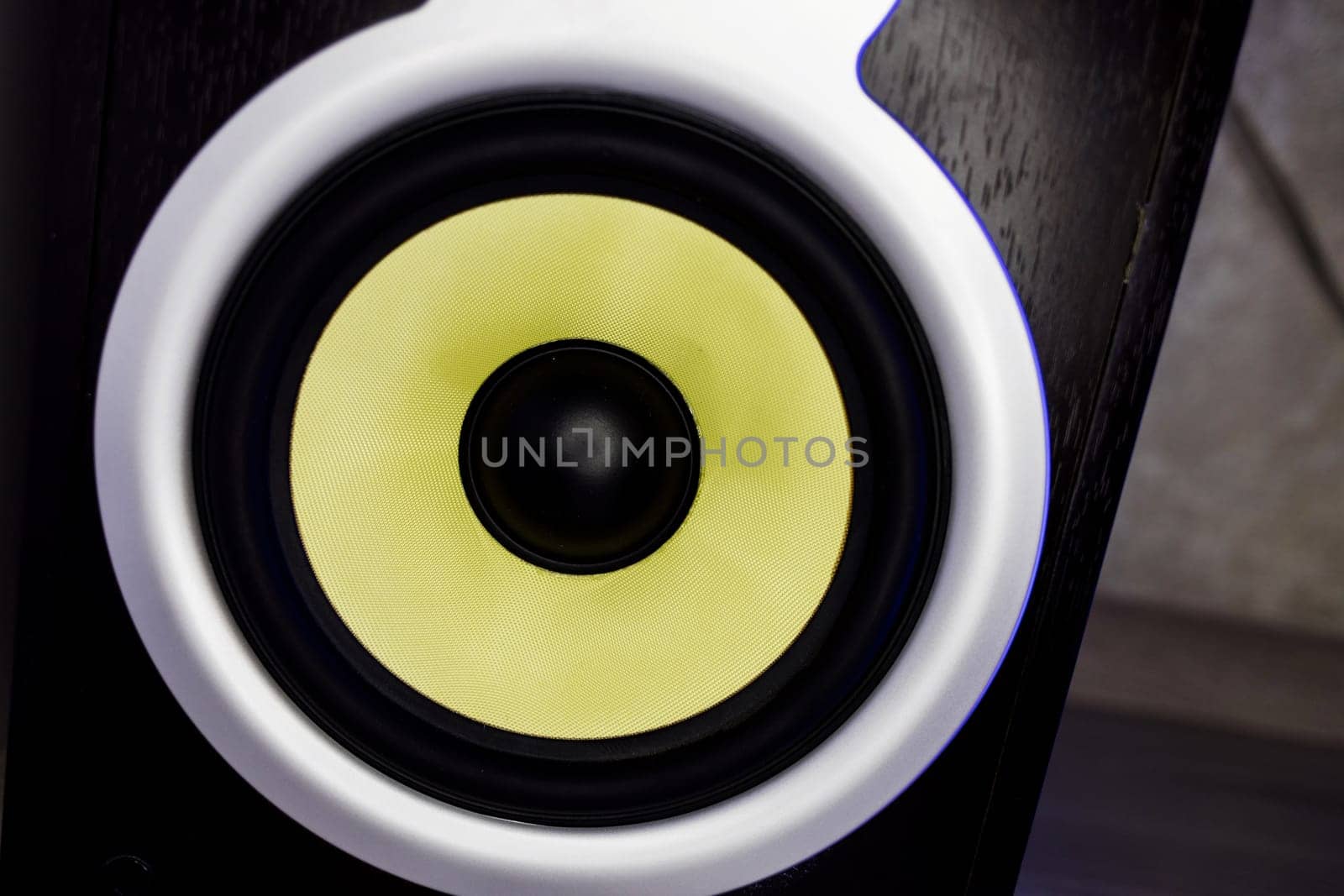 Yellow speaker. Music studio speaker